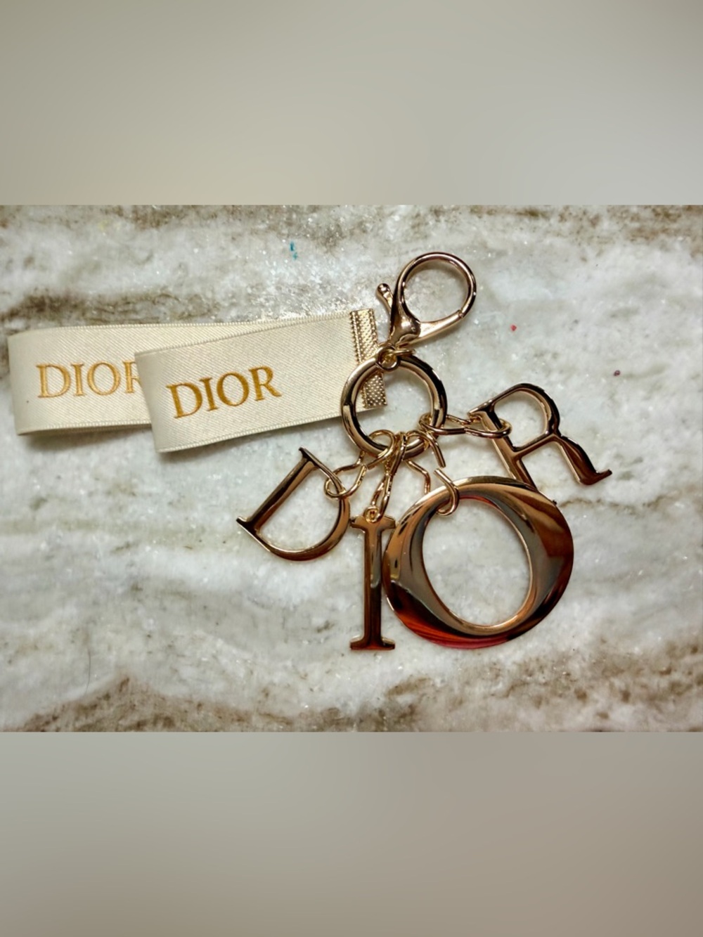 Gold D I O R Keychain/Bag Charm with Ivory Cloth Tag NEW/SEALED in Plastic Bag